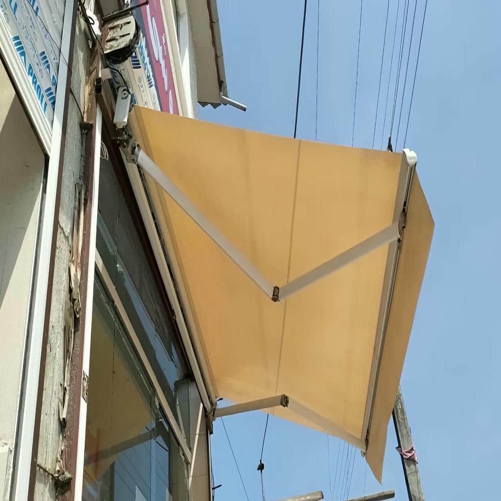 نصب سایبان برقی بازویی اتوماتیک مقاوم محیطی در کرمانشاه