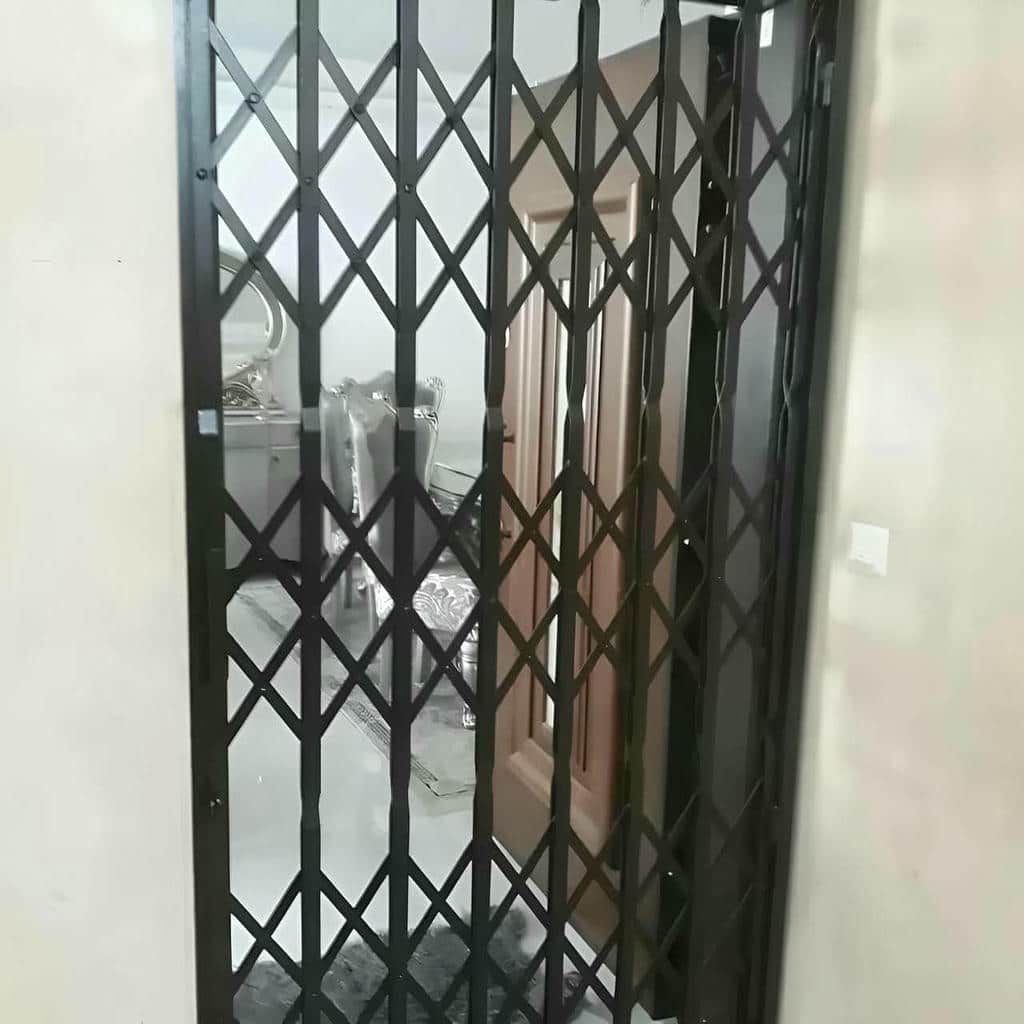 نصب درب آکاردئونی فلزی ضدسرقت چهارگل در قم