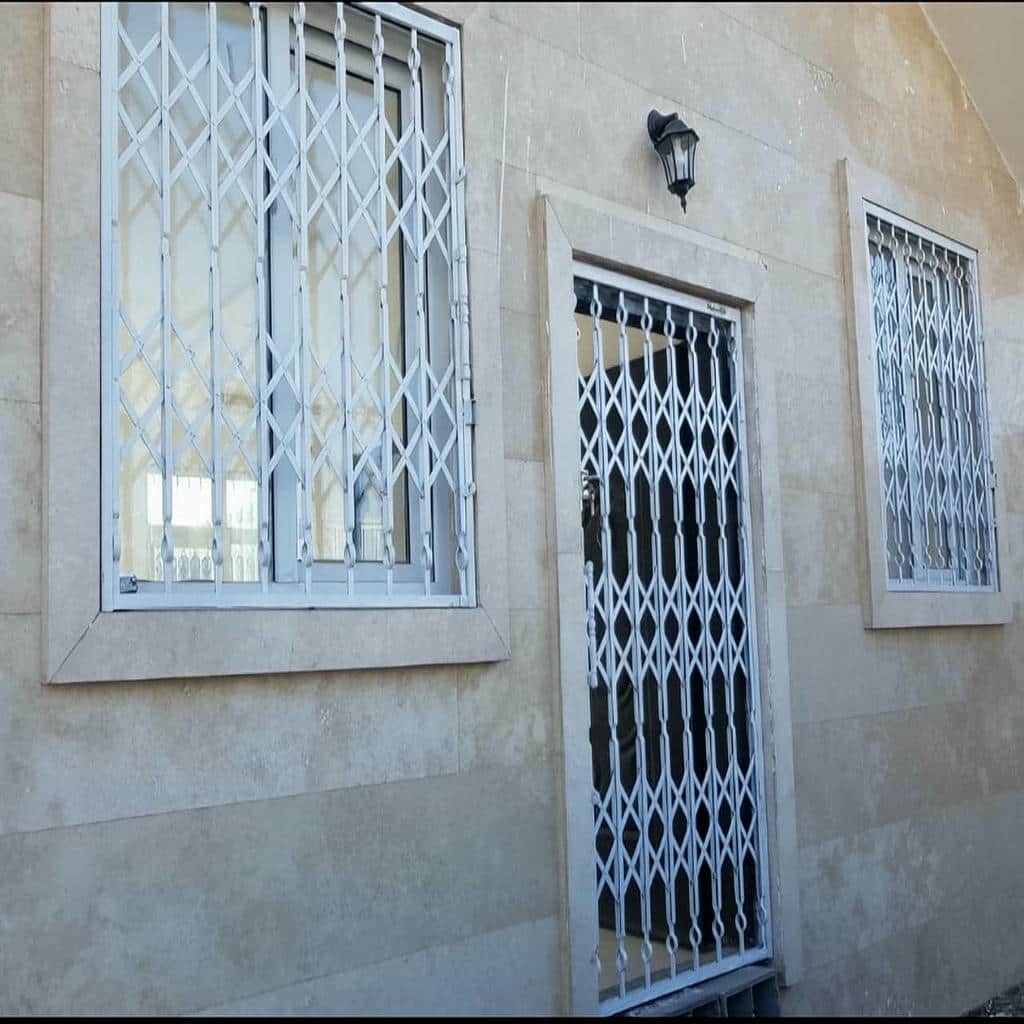 قیمت درب آکاردئونی فلزی ضدسرقت سه گل در قزوین