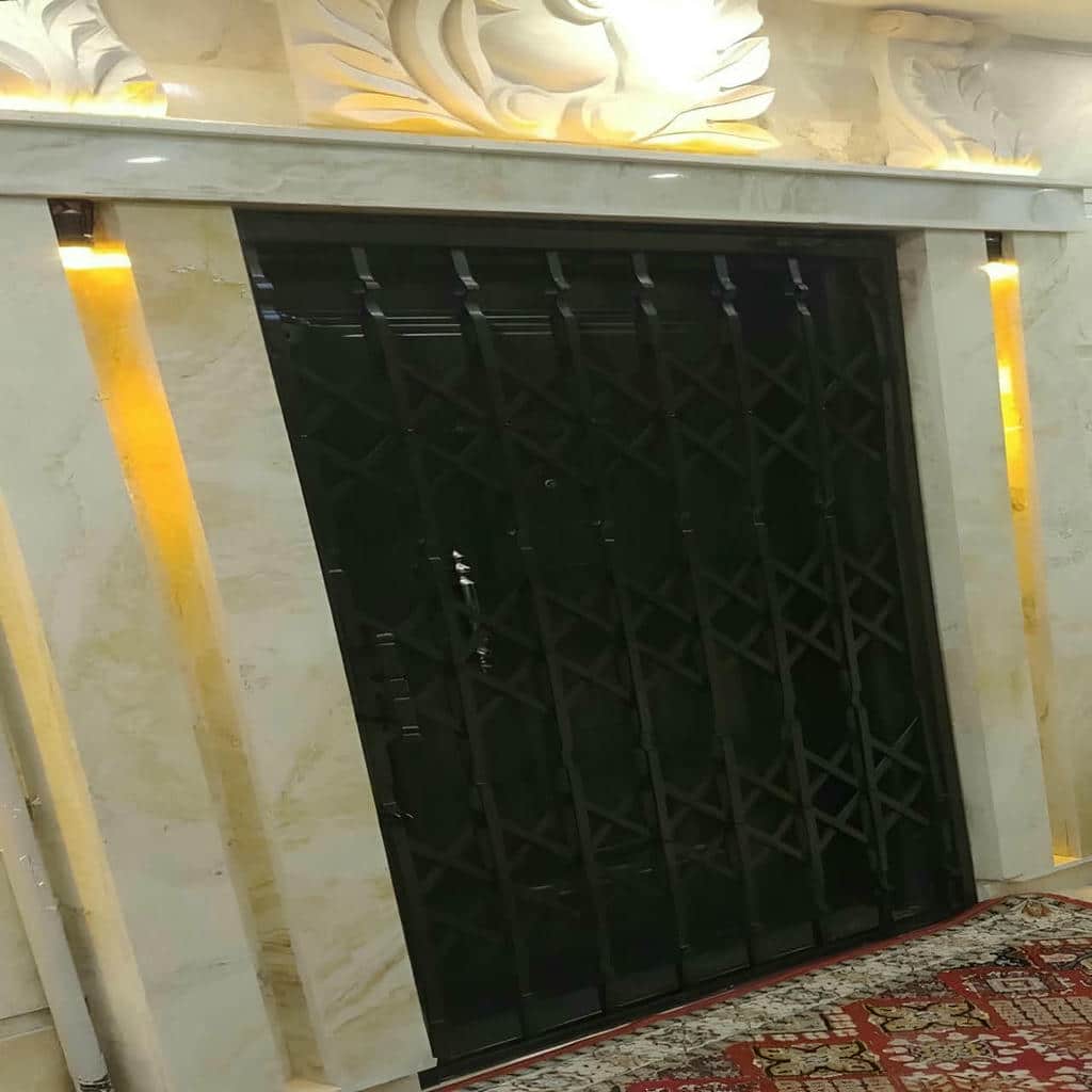 نصب درب آکاردئونی فلزی ضدسرقت چهارگل در بیرجند