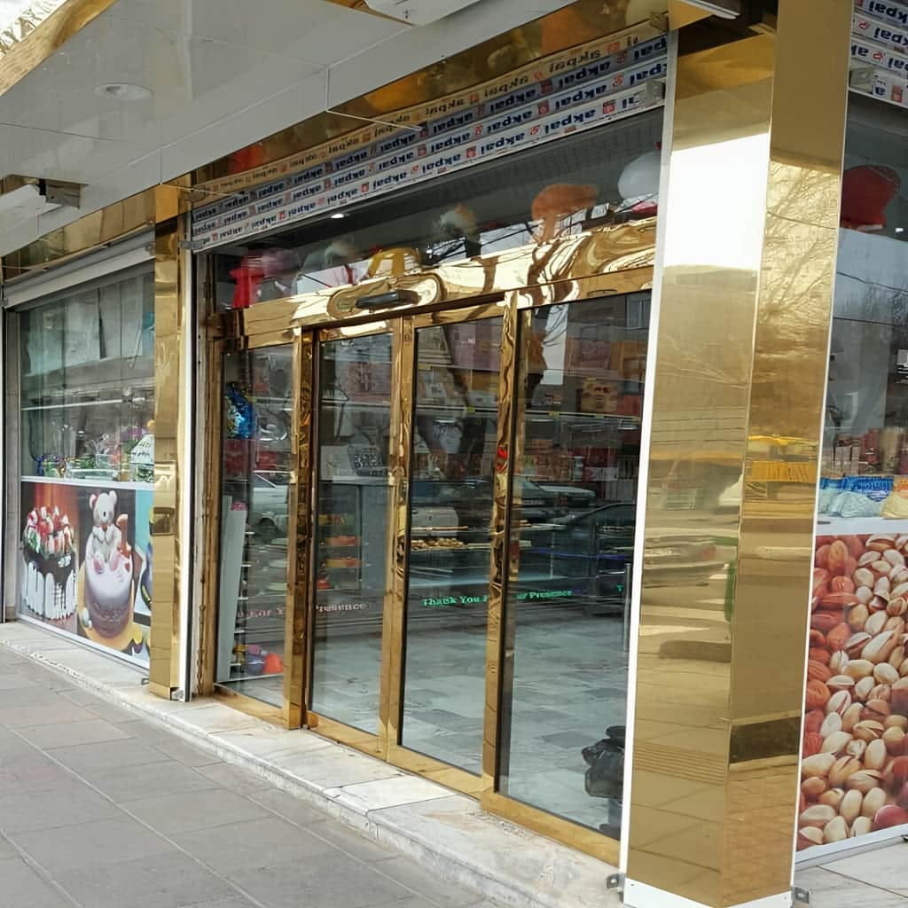 درب شیشه ای اتوماتیک فریم دار آلومینیوم با چشمی ایمنی ورودی
