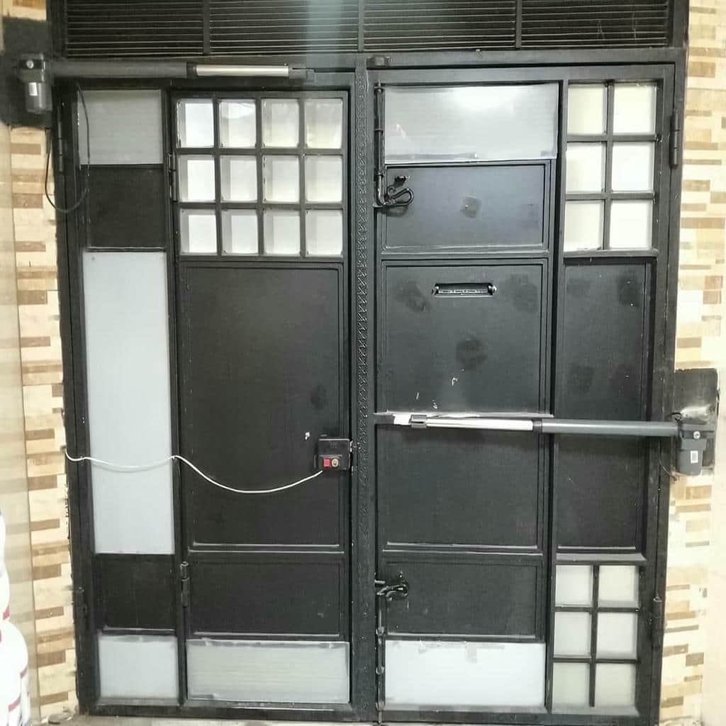 جک درب پارکینگ بازویی سفید کرمان