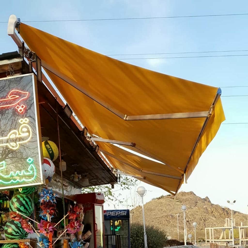 سایه بان متحرک بجنورد با طراحی هماهنگ نما سایه بان متحرک بجنورد با طراحی هماهنگ نما