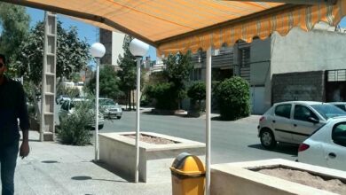 سایبان برقی بندرعباس بازویی با پوشش پارچه ای